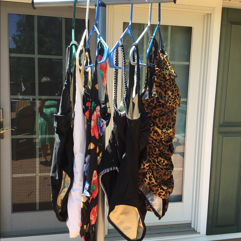 6 one-piece bathing suits.